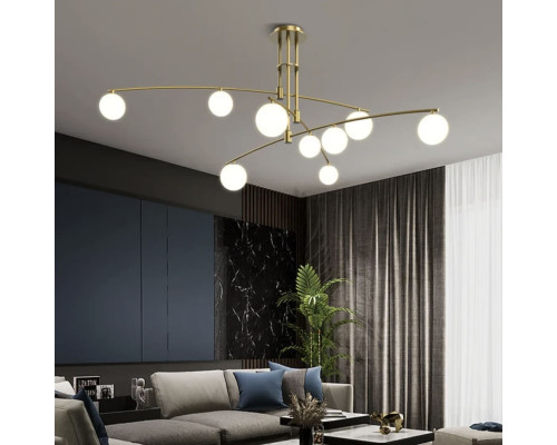 Aure - сучасна підвісна люстра в латунному каркасі