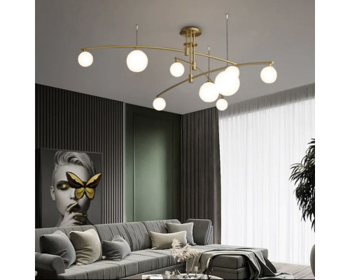 Aure - сучасна підвісна люстра в латунному каркасі