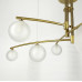 Aure - сучасна підвісна люстра в латунному каркасі