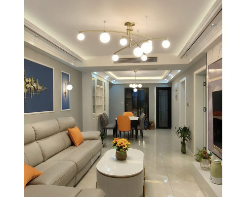 Aure - сучасна підвісна люстра в латунному каркасі