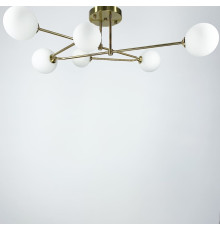 Стельова люстра в латунному корпусі з вигнутими ріжками на 6 ламп