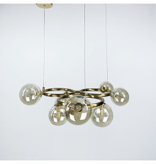 Латунна люстра Gorizia на 7 янтарних плафонів