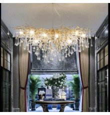 Розкішна видовжена люстра з скляними підвісами