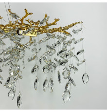 Видовжена золота люстра DIAMINA з кришталевим камінням у корпусі 150 см