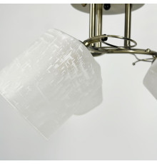 Бронзова люстра на 3 матових плафони з візерунком у корпусі Ø 50 см