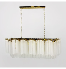 Латунна люстра з матовими скляними підвісками у видовженому корпусі 110х30 см