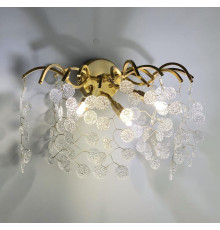 Бра в золотистому корпусі у вигляді гілочок з пелюстками