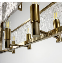 Видовжена люстра із скляними пластинами наче крига