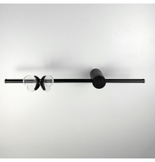 Бра у чорному корпусі з метеликом зліва